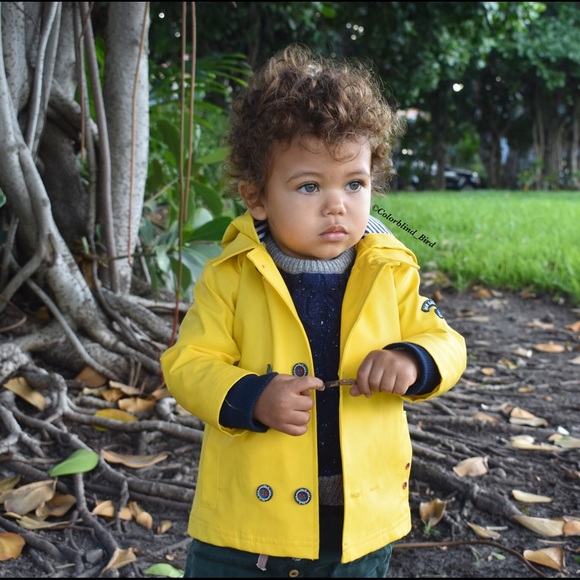 baby in raincoat